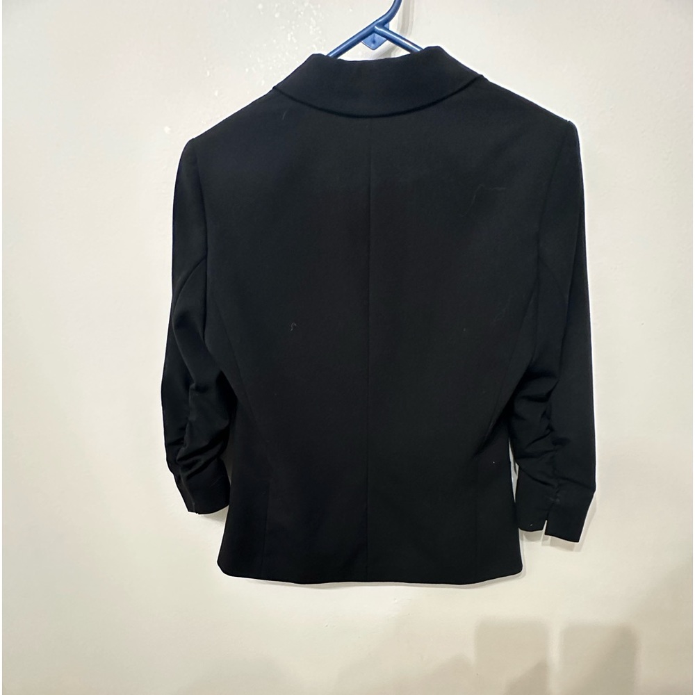 Black quarter length sleeve Calvin Klein blazer with roached sleeves
